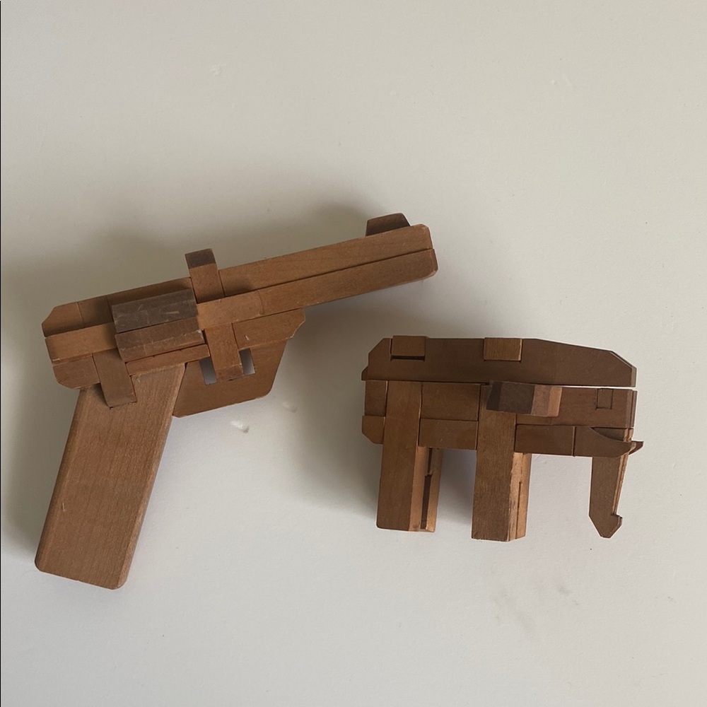 2 Vintage Japanese Kumiki burr wooden puzzles elephant toy Gun brain teasers